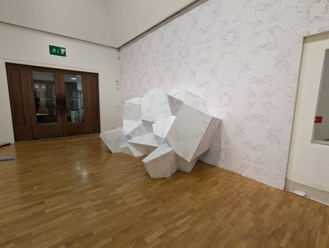 The wrapped form installed in the gallery, before the final elements were added
