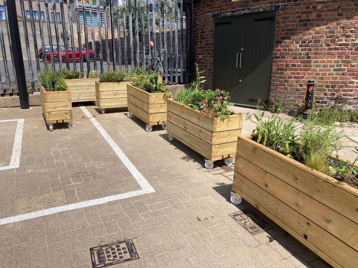 The six planters in a row at the Quentin Blake Centre, planted and in place