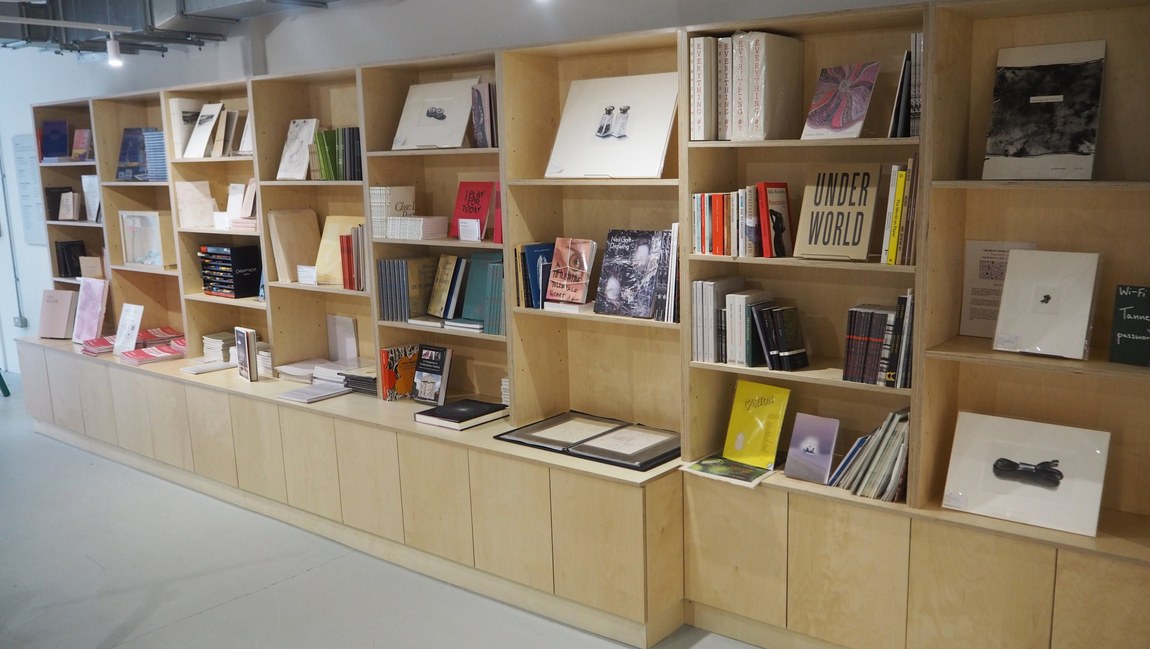 The reception, with the shelving running the length of the room