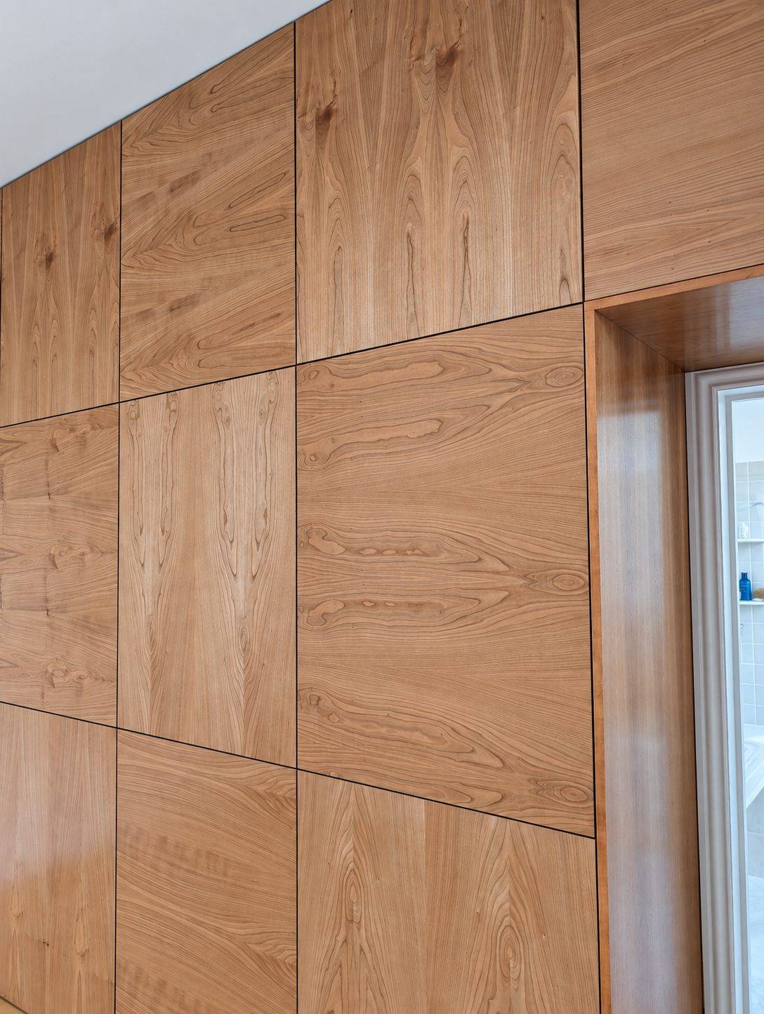 Close-up of the alternating grain pattern on adjacent door fronts